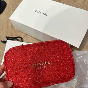 CHANEL NWT tweed cosmetic bag.